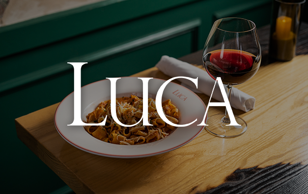 Luca logo over a photo of a bowl of pasta