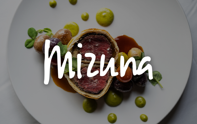 Mizuna logo over a photo of beef wellington on a plate
